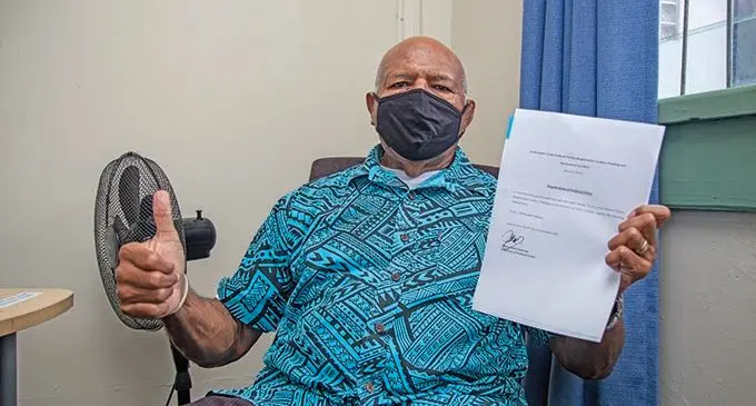 Sitiveni Rabuka on September 8, 2021, with the document approving the registration of this party, People’s Alliance.  Photo: Leon Lord