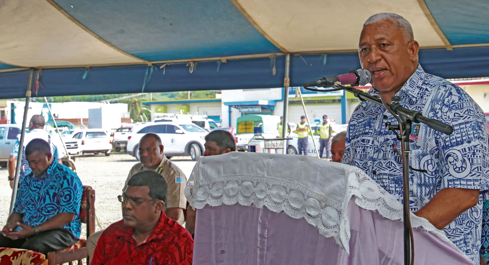 Minister for Waterways Mahendra Reddy (sitting left), and Prime Minister Voreqe Bainimarama at the public consultation at Tavua Town on February 16, 2018.