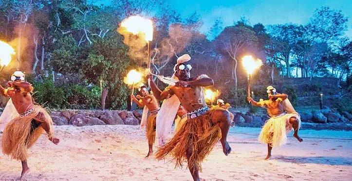 Fijians entertain tourists, Fijians greet tourists with songs.