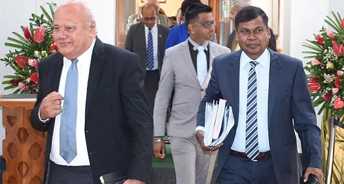 SODELPA MP Viliame Gavoka (left) and National Federation Party MP Biman Prasad outside Parliament on March 7, 2018.   Photo: Parliament of Fiji