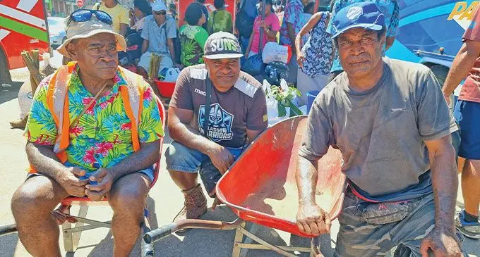 From left: Kauwai Youth Club President, Irimaia Buadakai, Tomu Tuinakarawa, 38, and Marika Tudonu, 60, at the Labasa Bus Stand on April 6, 2023. Photo: Sampras Anand