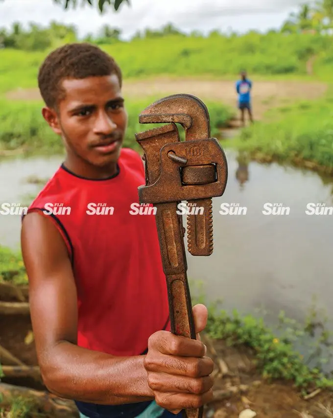 Kuku resident Ted Simone, 15, on May 26, 2022, shows a tool that was  allegedly used as a weapon during the attack.  Photo: Leon Lord