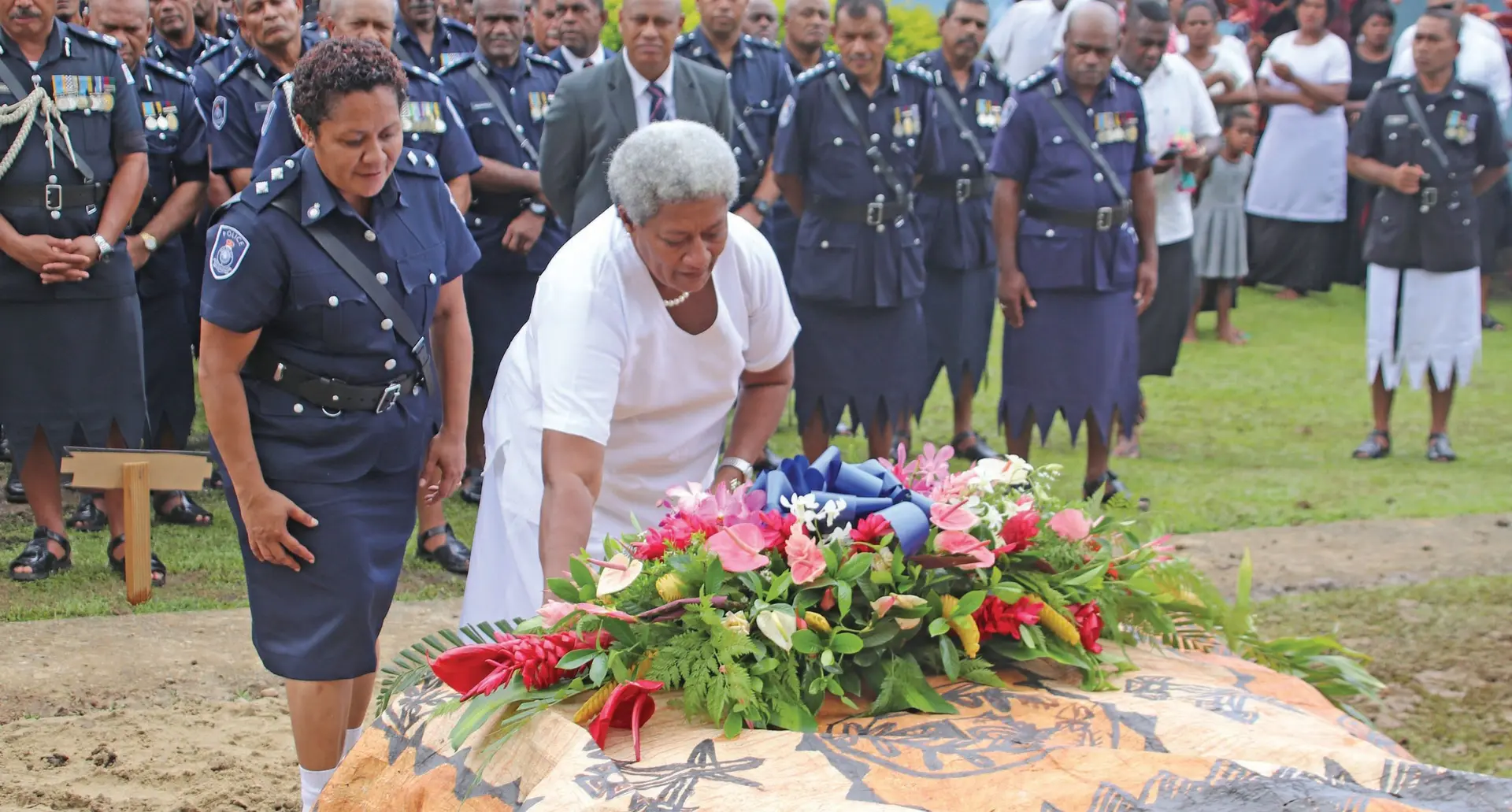 Lusiana Tagicakibau Bokadi places a wreath at the grave site of the late Director CID Semisi Bokadi at Namatakula Village, Nadroga, on February 9, 2018. Photo: Waisea Nasokia