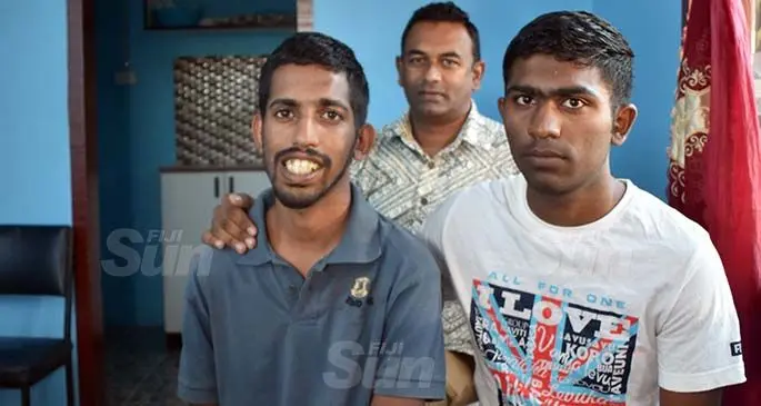 Nadi Special School counsellor Mohenesh Singh (back), with Jayesh Mishra and Rohal Ram inside their new home in Nadi on July 24, 2020. Photo: Waisea Nasokia