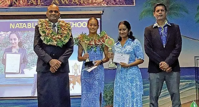 Commissioner Western, Apolosi Lewaqai, extracurricular category awardee, Ofa Lagonilakeba, academic category awardee, Inayah Adeebah Ali and Natabua High School principal, Viren Sharma after the school’s annual awards ceremony in Lautoka on November 25, 2022. Photo: Nicolette Chambers