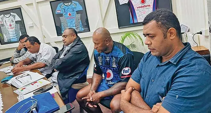 Fiji National Rugby League acting chief executive officer Don Natabe (first from right) and Fiji Bati head coach Wise Kativerata (second from right) at the FNRL headquarters in Suva. Photo: FNRL