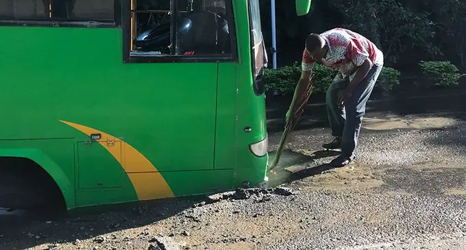 The Dominion Transport bus trapped in a pothole in Denarau Island.  Photo: Waisea Nasokia