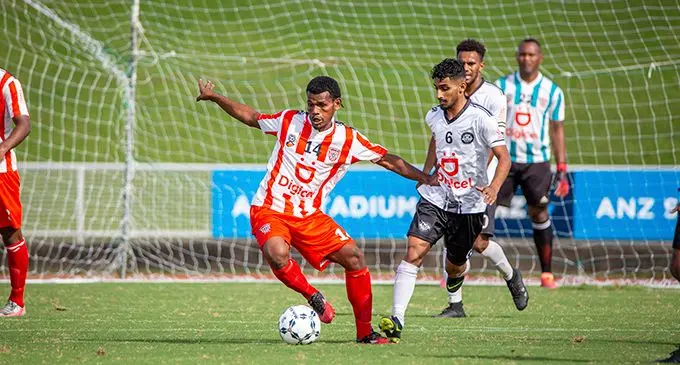 Labasa centreback Akeimi Ralulu shields the ball away from Suva midfielder Mohammed Ramzan during the Digicel Premier League clash on April 19, 2021 at the ANZ Stadium, Suva. Labasa won 1-0. Photo: Leon Lord 