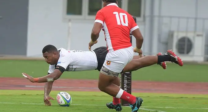 Fiji Warriors's Marika Vularewa dives in for their first try against Tonga during 2020 World Rugby Pacific Challenge at ANZ Stadium on March 10, 2020. Photo: Ronald Kumar.