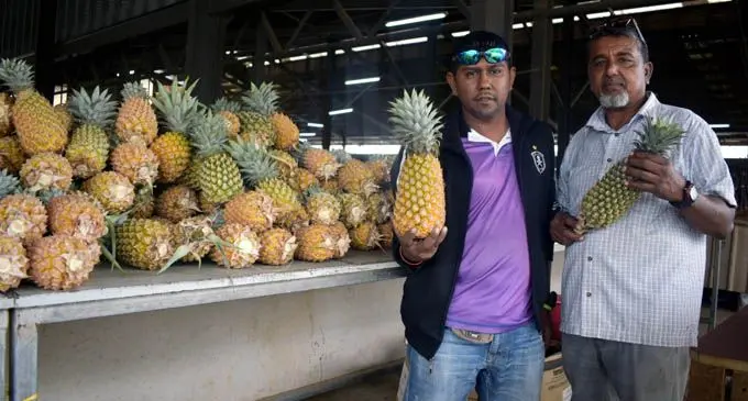 From left: Farmer and market vendor Dildar Hussein with his cousin Azad Ali at Nadi Market on July 2, 2018. Photo: Arieta Vakasukawaqa