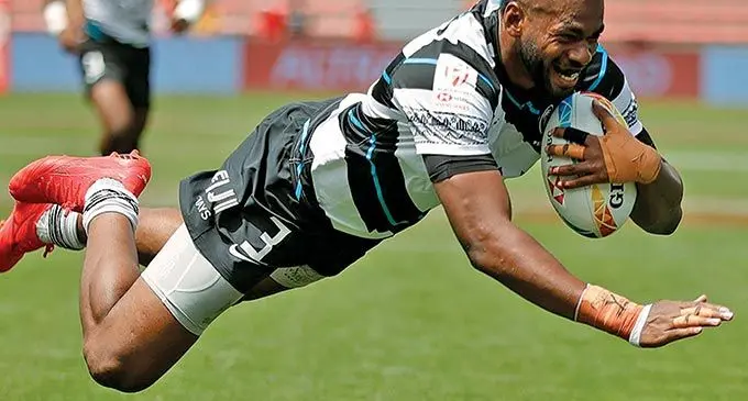 Fijian 7s forward Sevuloni Mocenacagi dives over to score try for Fiji during the Toulouse 7s on May 21, 2022. He is on the waiting list for the London 7s this weekend due to injury. Photo: Planet Rugby.
