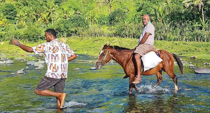 Assistant Minister in the Office of the Prime Minister Sakiusa Tubuna braved the two-hour travel on horseback on Easter Monday in Nasava. Photo: DEPTFO