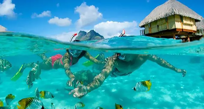 Tourists enjoying time out at one of the many resorts spread across the many islands that make up Fiji. Photo: www.hideawayholidays.com.au/travel-blog/fijian-language/