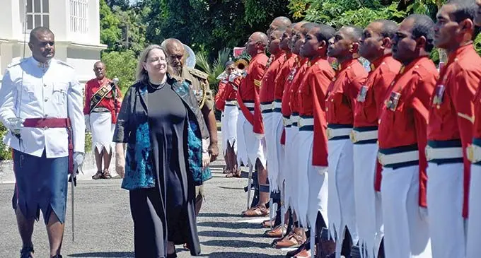 United States of America Ambassador Marie Damour is accorded a guard of honour.