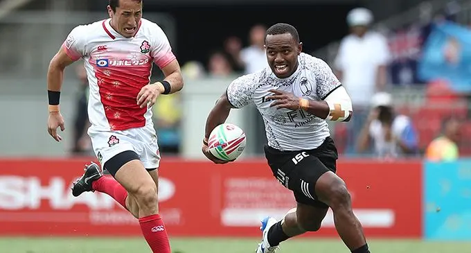 Fiji Airways Fijian 7s playmaker Waisea Nacuqu runs away from a Japanese player druing the Sydney 7s in the 2018/19 World Sevens Series.  Photo: World Rugby