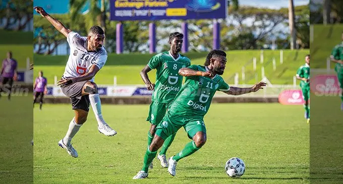 Ram Cleaning Service Suvsa striker Samuela Drudru (left) makes an attempt as Nadi captain Ilimotama Jese challenges him with defender Ashneel Kumar looking on at the HFC Bank Stadium in Suva on August 7, 2022. Photo: Leon Lord