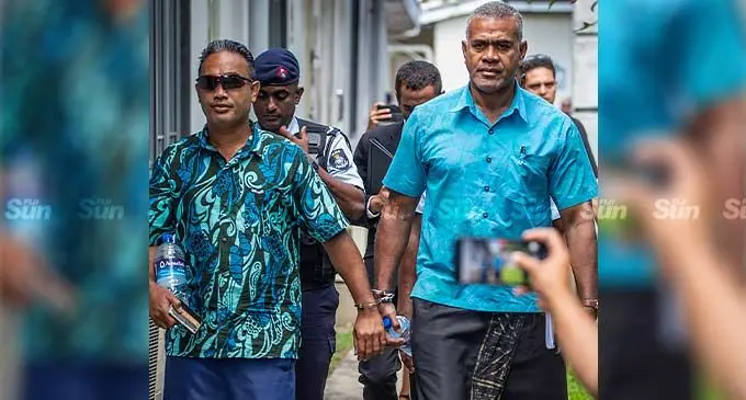 We Unite Fiji (WUF) party members Abel Camilo (left) and Dr Jone Hawea arriving at the Suva Magistrates Court on December 19, 2022. Photo: Leon Lord