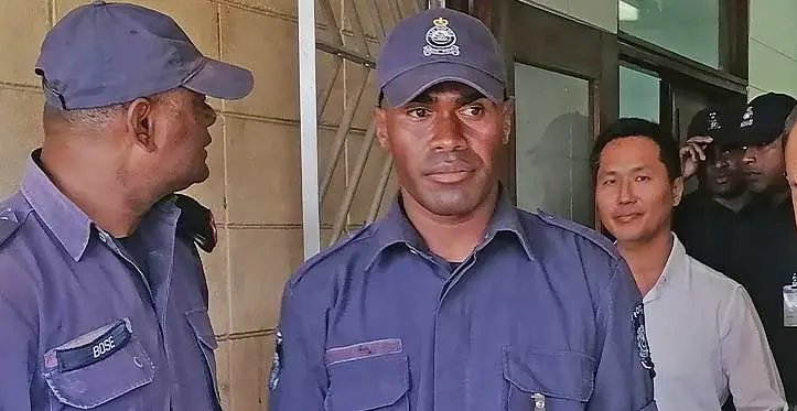 Daniel Kim accompanied by Police officers at Lautoka High Court. Photo: Mereleki Nai
