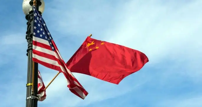 File photo shows the national flags of China (R) and the United States on the Constitution Avenue in Washington, United States.(Xinhua/Bao Dandan)