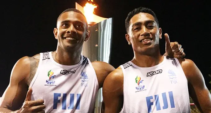 Our top sprinters Banuve Tabakaucoro (left) and Tony Lemeki after the 100m men’s final of the Pacific Games in Apia, Samoa on July 16, 2019.  Photo: Ronald Setu