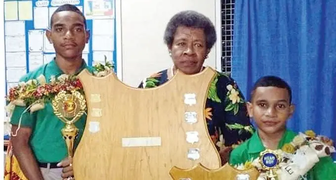 Harry Suli Tuinisautu Matavesi with his younger brother Usaia Jabez Matavesi  and grandmother Milika Balemailakeba Nabunobuno Goneyali  during the annual prizegiving on December 10, 2020. Photo: Salote Qalubau