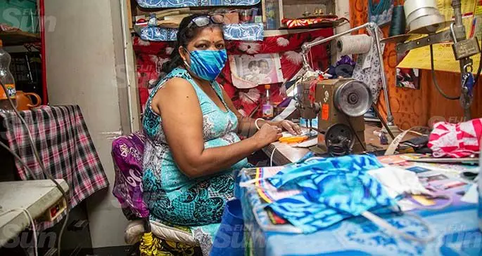 Flea market vendor Roshni Devi 50, making face masks in Suva on the 23rd April 2021. Photo: Leon Lord