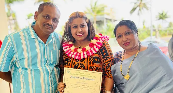 Shruti Chand (middle), with her father, Susil Chand and mother, Sangeeta Devi, following her graduation from Makoi Women’s Vocational Training Centre in Makoi on August 18, 2022. Photo: Nolishma