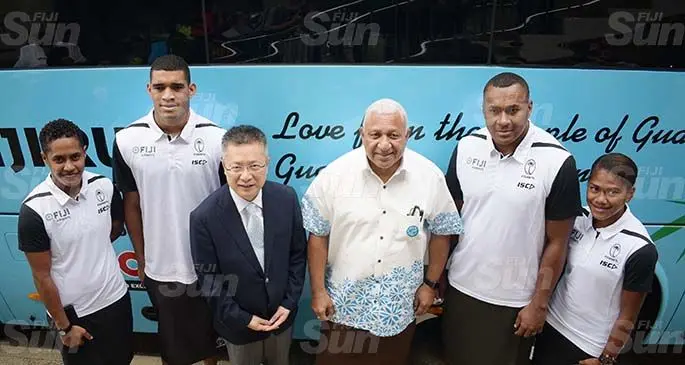 From left: Luisa Tisolo, Meli Derenalagi, People’s Republic of China’s Ambassador to Fiji Qian Bo, Prime Minister and Fiji Rugby Union president Voreqe Bainimarama, Paula Dranisinukula, Tokasa Seniyasi during the handover of the buses at Albert Park, Suva on May 21, 2020. Photo: Ronald Kumar