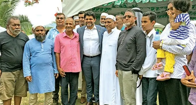 Attorney-General Aiyaz Sayed-Khaiyum (fourth from left) with the residents of Tangnikula at Wainikoro Jame Masjid on October, 25, 2020.    