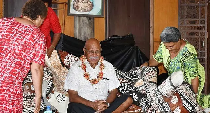 Prime Minister Sitiveni Rabuka is presented with traditional gifts by the women of Bau during his visit to the Island on December 31, 2022.   Photo: DEPTFO
