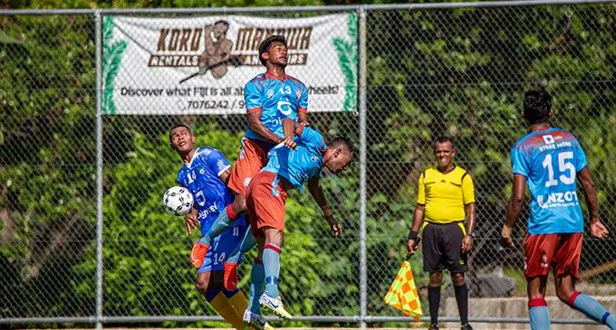 Nathan Hussain of Nasinu in an aerial battle against Lautoka striker Sairusi Nalaubu during their Digicel Premier League match at the Uprising Sports Centre in Pacific Harbour, Deuba, on April 10, 2022. Photo: Leon Lord