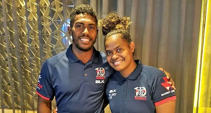 Queensland Reds squad member Vani Vaa’ga Arei (right) with cousin and Flying Fijians halfback, Frank Lomani. 