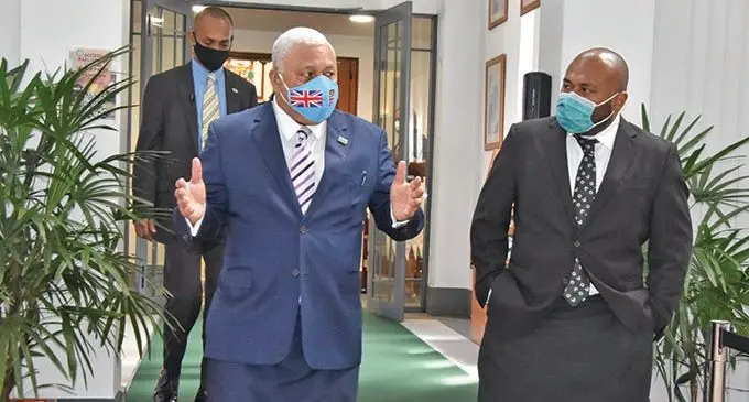 Prime Minister Voreqe Bainimarama with Minister for Health and Medical Services  Dr Ifereimi Waqainabete at Parliament . Photo: Parliament of Fiji