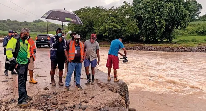Minister for Rural and Maritime Development and Disaster Management Inia Seruiratu (centre) at the Balevuto Irish Crossing in Nalotawa, Ba on January 11, 2022.