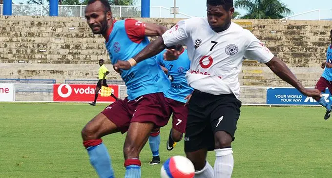 Suva's Gagame Feni tussles with Nasoni Mereke of Nasinu during the Vodafone Premier League match at ANZ Stadium Suva on February 17,2019. Photo: Simione Haravanua.