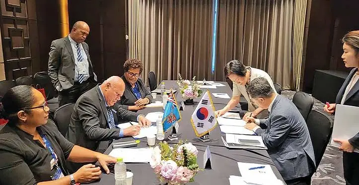 The Deputy Prime Minister and Minister for Tourism and Civil Aviation, Viliame Gavoka and Director-General Aviation Policy Bureau of the Korean Ministry of Land, Infrastructure and Transport, Kim Yeong Kook sign the memorandum of understanding. Photo: DEPTFO News