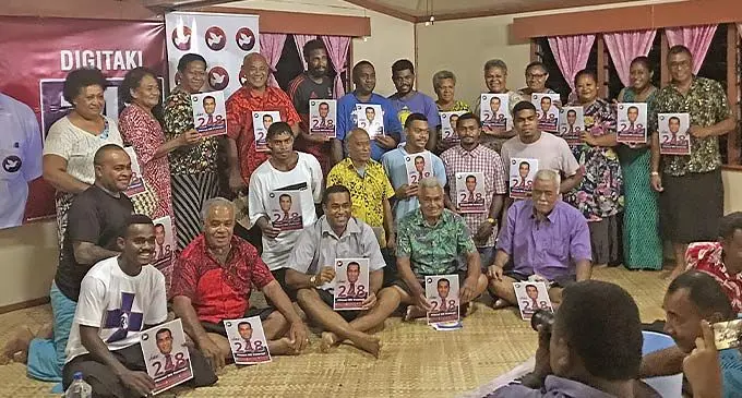 People’s Alliance candidate Filimoni Vosarogo (sitting third from left) with residents of Naveiwakau, Valelevu during a campaign meeting held in the area on November 28, 2022. Photo: Inoke Rabonu