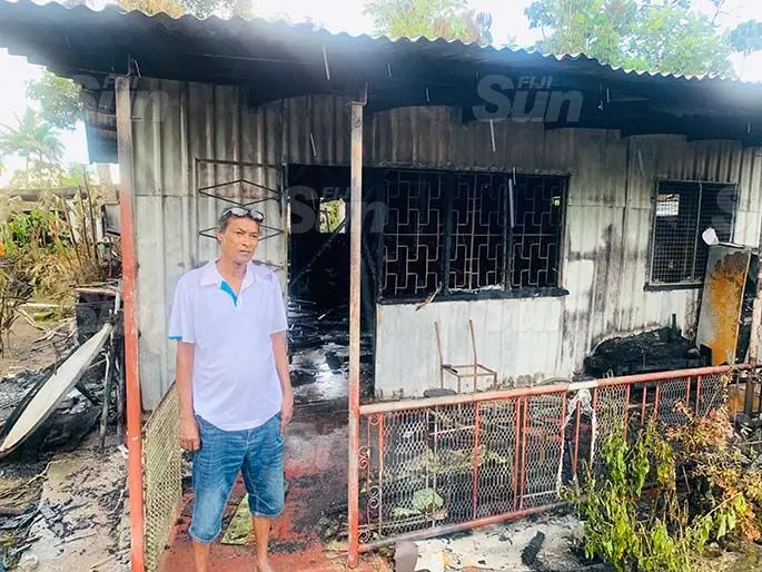 Johnny Michael, outside his house on January 20, 2021. Photo: Fonua Talei