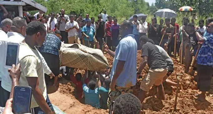 Pall bearers place the casket of the late Pacific Flying School instructor Ilesa Tawalo at the Enamanu cemetary in Nadi on March 8, 2018.  Photo: Waisea Nasokia