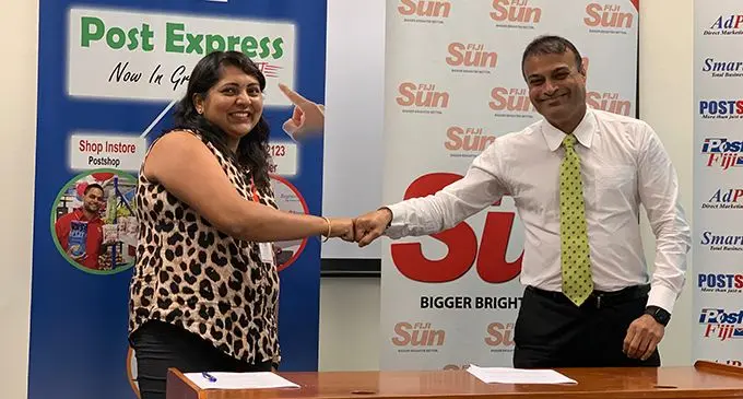 Fiji Sun finance manager Jyotishna Chand and Post Fiji chief executive officer Anirudha Bansod after the signing of the MOU  agreement on May 28,2020. Photo: Frederica Elbourne