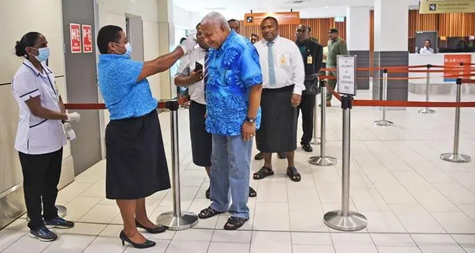 LEADING THE CHARGE... Prime Minister Voreqe Bainimarama undergoes a check while touring the Nadi International Airport on March 17, 2020. The PM was accompanied by the Minister for Health and Medical Services, Dr Ifereimi Waqainabete, during the tour. Photo: DEPTFO News