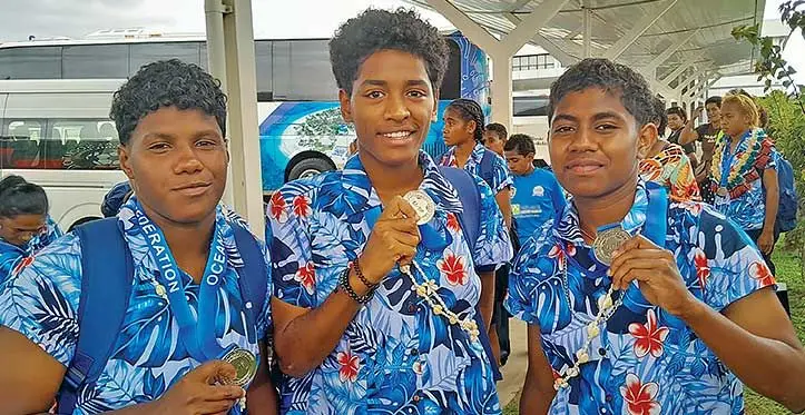 Members of the Digicel Fiji Under-16 football team (from left) Rosalain Saraphina, Seruwaia Laulaba and Kasanita Tabua at the Nadi International Airport on October 3, 2023. Photo: Waisea Nasokia