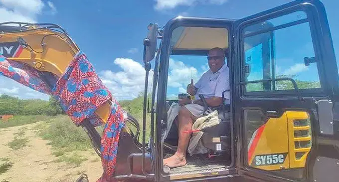 Deputy Prime Minister Manoa Kamikamica in the new excavator at Malolo Village in Nadi.