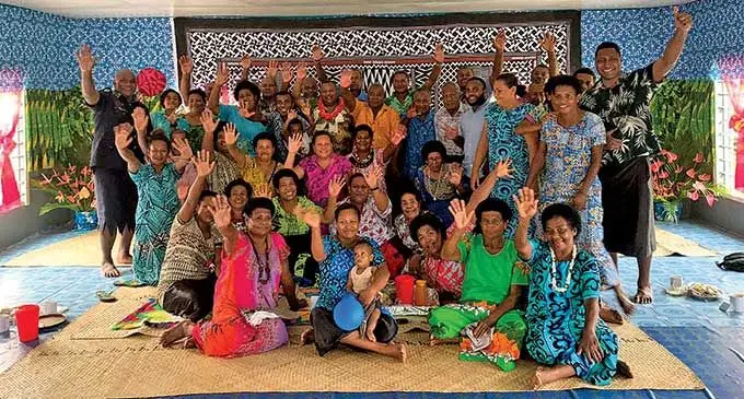 Minister for Defence, National Security and Policing, Rural and Maritime Development and Disaster Management, Inia Seruiratu (middle), with the villagers of Bagasau in Cakaudrove during the commissioning of evacuation centre on March 18, 2022. Photo: Ministry of Defence, National Security and Policing, Rural and Maritime Development and Disaster Management. 