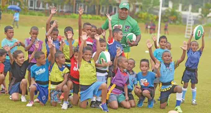 Seremaia Bai with children who attended the the Milo Tag Festival at Albert Park on August 24, 209. Photo: Ronald Kumar.