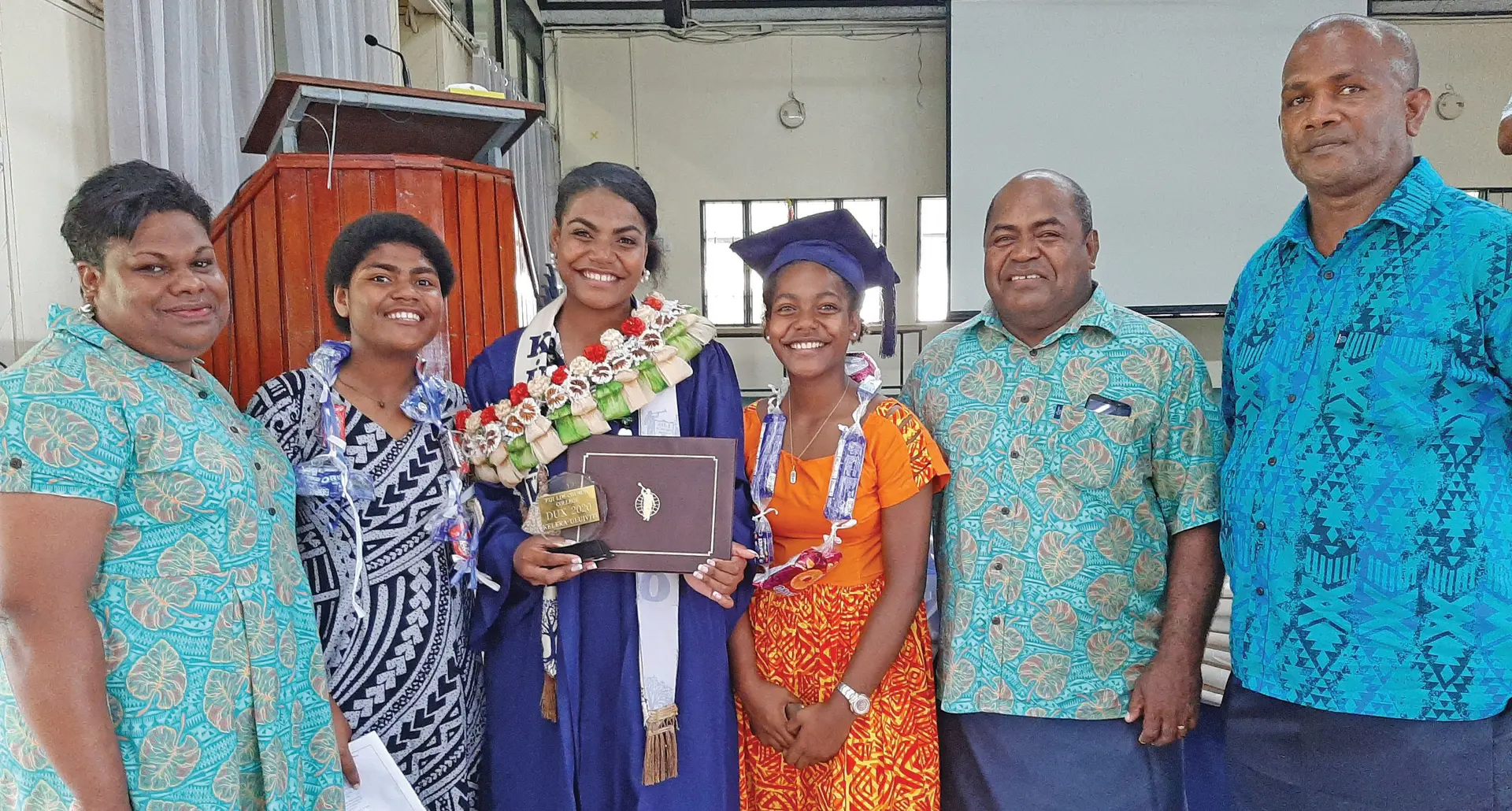 From left: Katherine Uluiviti (step-mother), Sainimili Uluiviti (sister), Kelera Uluiviti, Ane Uluiviti (sister), Epineri Uluiviti (father) and Alipate Rokobiau (Soloira District School Head teacher) after the LDS Church College graduation ceremony on December 12, 2020. Photo: Shreeya Verma