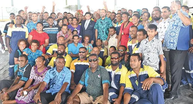 Acting Prime Minister and Attorney-General Aiyaz Sayed-Khaiyum at Drasa, Lautoka, with staff members of Fiji Pine Limited and their families. Report >P12. Photo: DEPTFO News