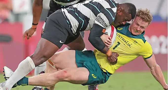 Team Fiji men’s rugby sevens utility Asaeli Tuivuaka makes a tackle against Australia’s Lachie Miller at the Tokyo 2020 Olympic Games. Tuivuaka, is one the players being eyed by Flying Fijians head coach Vern Cotter for the November Test series. Photo: World Rugby