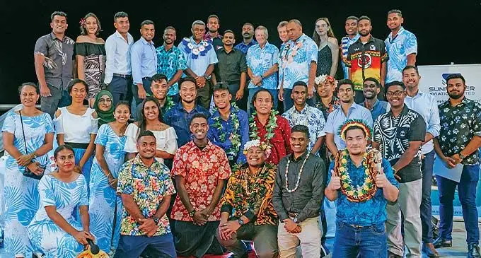 Pacific Flying School graduates and executives with (standing back row, sixth from left) Fiji Airways Boeing 737 Captain, Gideon Leweniqila, (fifth from right) PFS chief flight instructor, Apenisa Golea and (sixth from right) Joyce Aviation Group Fiji Pte Limited chief executive officer, Tim Joyce in Nadi on November 19, 2022. Photo: Precious Moment