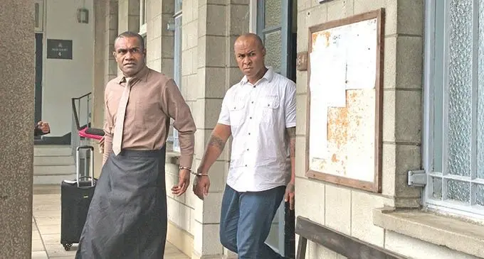 Salesi Suka Rasoqosoqo (white shirt) and Peni Narawa (brown shirt) outside the High Court in Suva on February 1, 2021.  Photo: Ashna Kumar